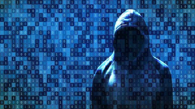 Man wearing a hood, symbolizing the anonymity of cyber attackers, with dark data and coding elements in the background