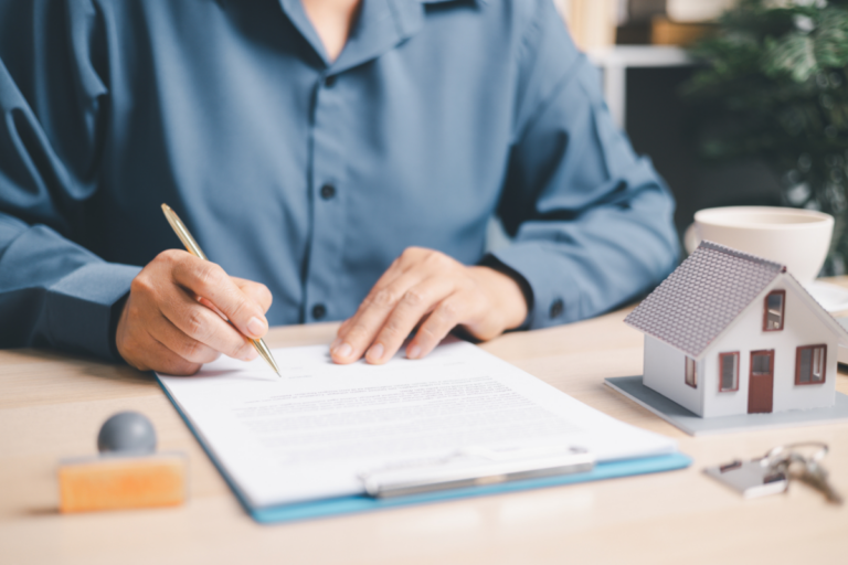 Homeowner reviewing a homeowners insurance declaration page to understand their policy coverage and limits